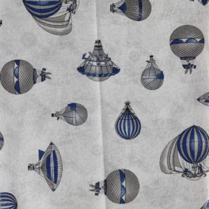 Διακοσμητικές μαξιλαροθήκες με αερόστατα σε μπλε και γκρι.