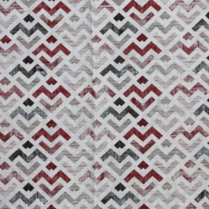 Διακοσμητική μαξιλαροθήκη με πολύχρωμα γεωμετρικά σχέδια.